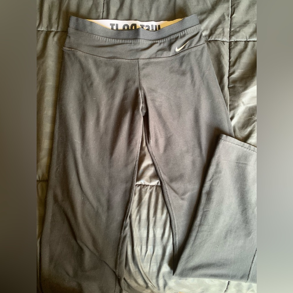 nike pants and under armour shorts